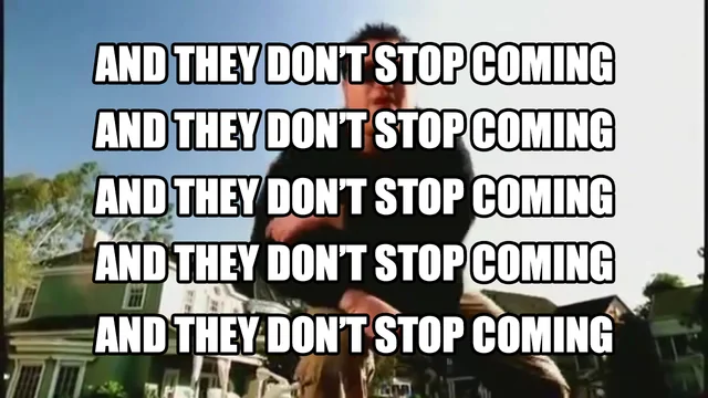 Another frame from the “All Star” music video with the same repeated lyric.